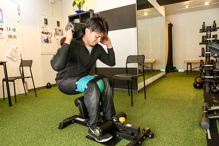 写真：専用の用具は使わなくても障害のある方もトレーニングできる